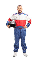 Young male car racer in overalls holding a helmet © Ljupco Smokovski