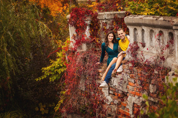 Couple, ancient place and autumn