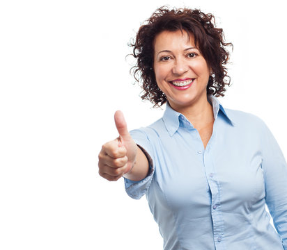 Portrait Of A Mature Woman Doing A Positive Gesture On A White Background