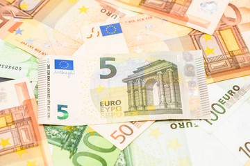 Five Euro Banknote On Euro Bills Background