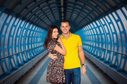 Adult couple in blue tunnel
