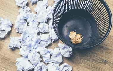 Paper balls in a bin