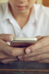 businessman using a mobile phone with texting message