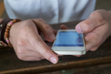 businessman using a mobile phone with texting message