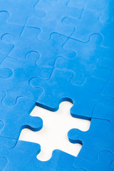 Puzzle pieces. Business concept for completing the final puzzle piece