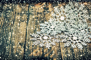 Christmas vintage decoration snowflakes with falling snow
