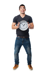 full body young man worried holding a clock