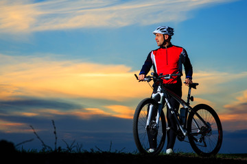 Obraz premium Cyclist Riding the Bike