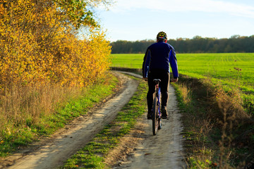 Fototapeta premium Cyclist Riding the Bike