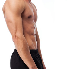 closeup of a strengh fitness body over white