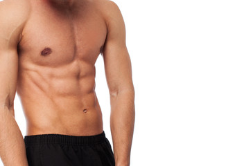 closeup of a strengh fitness body over white