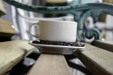 Coffee Mug on Wooden Chair
