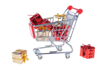 shopping cart with christmas gifts isolated on white background