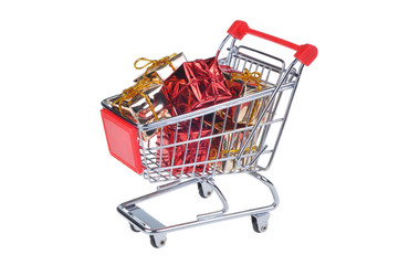 shopping cart with christmas gifts isolated on white background