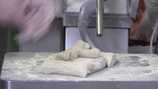 weighing of the bread dough portions 
