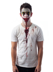 Portrait of an evil clown over white background