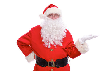 Kind Santa Claus pointing in white blank sign, isolated on white background