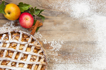 Home made apple pie sprinkled with fine sugar