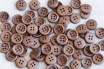 A scattering of wooden buttons