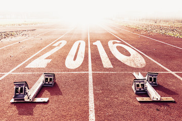 new year 2016 warm look numbers painted on a racing lane