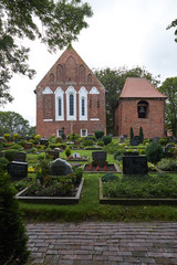 Fototapeta na wymiar St.-Batholomäus-Kirche Dornum, Ostfriesland, Niedersachsen, Deu