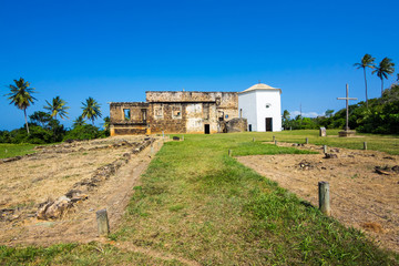Fototapeta na wymiar View of Garcia D'Avila Castle, or Casa da Torre, in Praia do Forte, Bahia, Brazil. The castle was built by Portuguese colonizers between 1551 and 1624 as a residence and military stronghold.