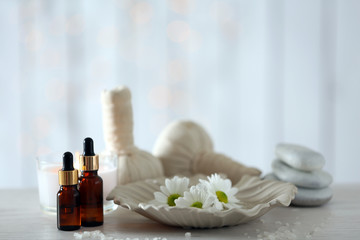 Beautiful composition of spa treatment on wooden table