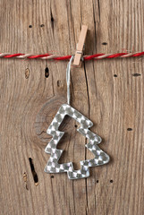 Christmas decoration with instant photo on old wooden background