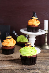 Halloween cupcakes on wooden table