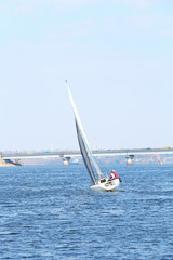 Sailing yacht on river