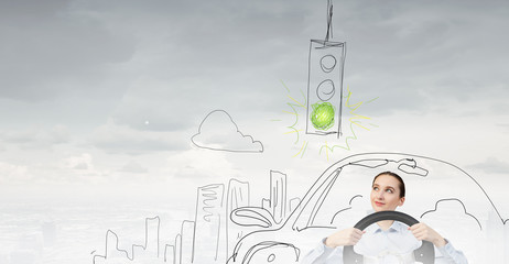 Woman with steering wheel