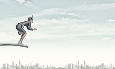 Businesswoman diver. Concept image