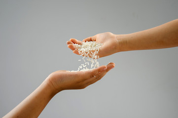 White jasmine rice in kid hand