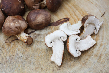 shiitake mushrooms on a wooden cutting board