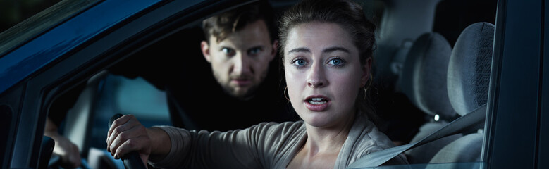 Obraz premium Felon attacking woman in car