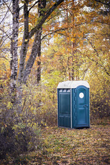 Portable toilet at an outdoor - obrazy, fototapety, plakaty