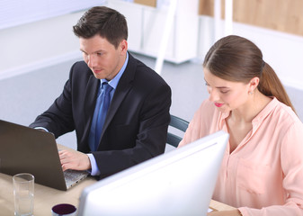 Business meeting -  manager discussing work with his colleagues