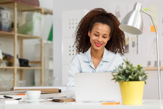 Graphic designer at work - Powered by Adobe