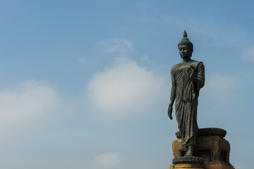 Standing Buddha statue in Thailand