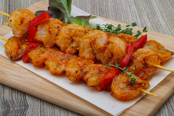 Raw tiger shrimps skewer