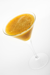 Fruit cocktail in a cocktail glass isolated on white background