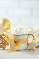 Beautiful composition with cup of cappuccino and Christmas cookies