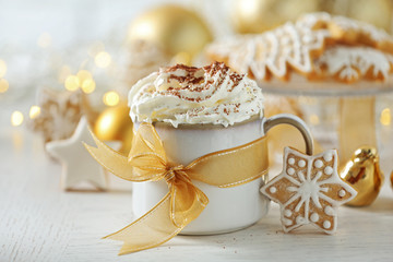 Beautiful composition with cup of cappuccino and Christmas cookies