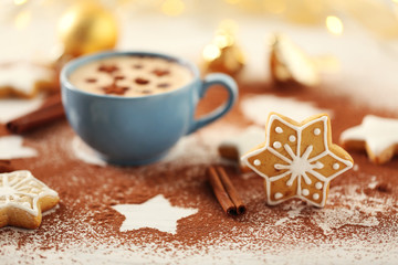 Beautiful composition with cup of cappuccino and Christmas cookies