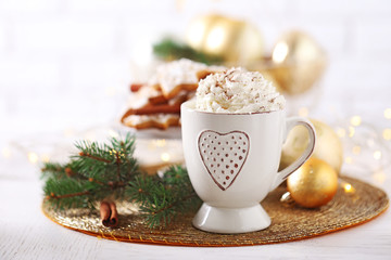 Beautiful composition with cup of cappuccino and Christmas cookies