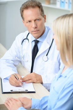 Professional doctor examining his patient 