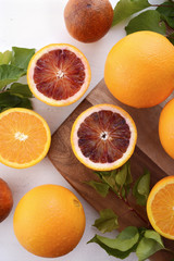 Mixed Oranges on Chopping Board