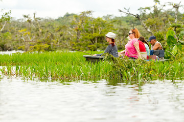 Experience the thrill of fishing legendary piranha fish amidst the lush,untouched wilderness of the Ecuadorian Amazon Rainforest,a top tourist attraction in South America.