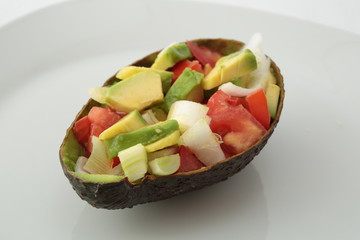 mixed salad on a natural bowl of avocado