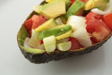 mixed salad on a natural bowl of avocado